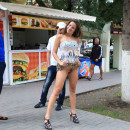 Shameless smiling teen flashes at public