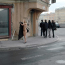 Absolutely naked blonde walks at public streets