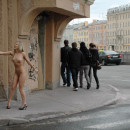 Absolutely naked blonde walks at public streets