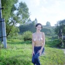 Retro session of one busty brunette outdoors