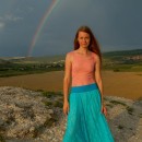 Very sweet girl and a rainbow
