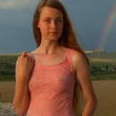 Very sweet girl and a rainbow