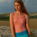 Very sweet girl and a rainbow