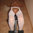 Blonde in white stockings shows shaved pussy on fitness machine