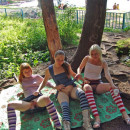 Three slutty girl on picnic at public park