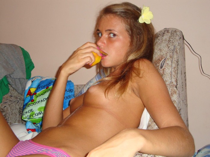 Cute teen with tanned body in pink panties