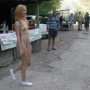 Redhead Margarita S walking naked at tourist place in the mountains