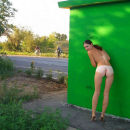 Crimean girl with deep tan lines on highway