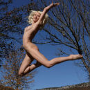 Gorgeous blonde Nika N shows all her body at mountain lake