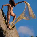 Slim cutie with no clothes on top of the stone