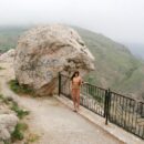 Naked Masha E posing near ruined castle