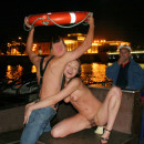 Naked guide spreads her legs in front of the captain