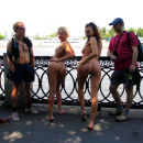 Two hot lesbians in front of a group of guys at public park