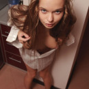 Long-haired teen Milena D with fur pussy at kitchen