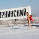 Brunette from Chelyabinsk posing at shovel monument