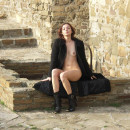 Flat-chested girl flashes at Genoese fortress