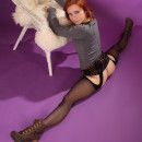 Amateur redhead flexible girl in purple studio
