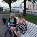 Russian flasher Inna undressing at city square