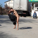 Young girl naked on the street