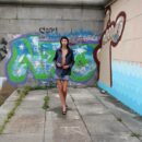 Skinny brunette with piercing