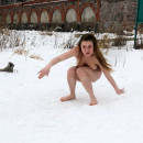 Busty teen posing at winter outdoors
