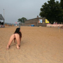 Perfect teen Martina A shows her body near sand sculptures