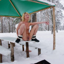 Blonde with big beautiful pussy pee on the snow