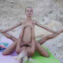 Hot teens Milena D and Nika N lick pussies on rocky beach