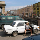 Russian amateur blonde undresses on the square
