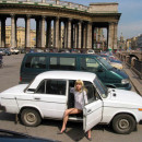 Russian amateur blonde undresses on the square