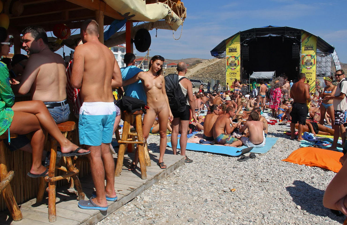 drunk naked beach bar - Naked nudist babe drinks some tekila at public beach bar. 20 photos