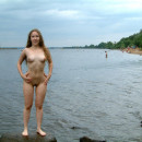 Naked teen girl with big ass at public beach