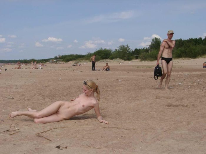 Blonde sunbathing naked at public beach