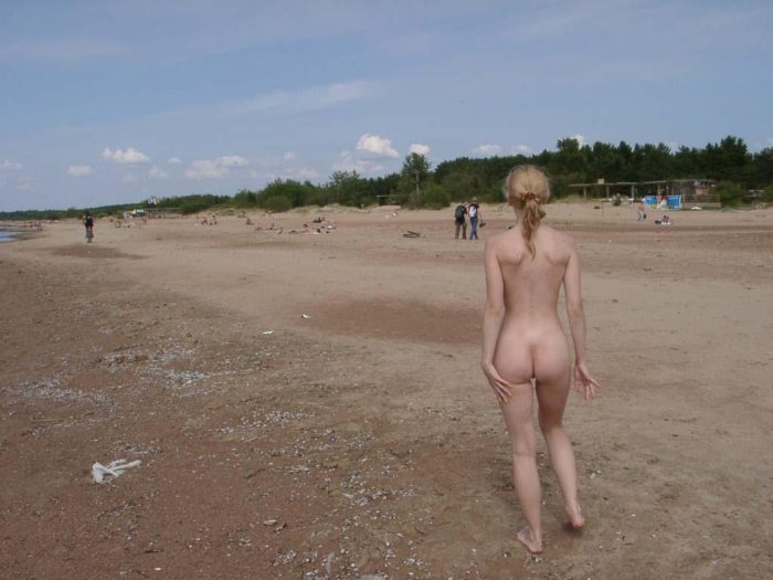 Blonde sunbathing naked at public beach
