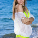 Izabel A s refreshing beauty coupled by her enganging smile stands out in this beach photo shoot