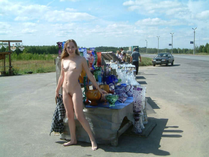 Amateur small-tittied teen flashes at road market