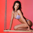 Brunette Elizabeth with hot natural body in pink studio