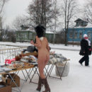 Brunette without clothes do some souvenir shoping