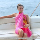 Cira Nerri sensually poses in the yacht as she bares her nubile body with perky tits and sweet pussy.