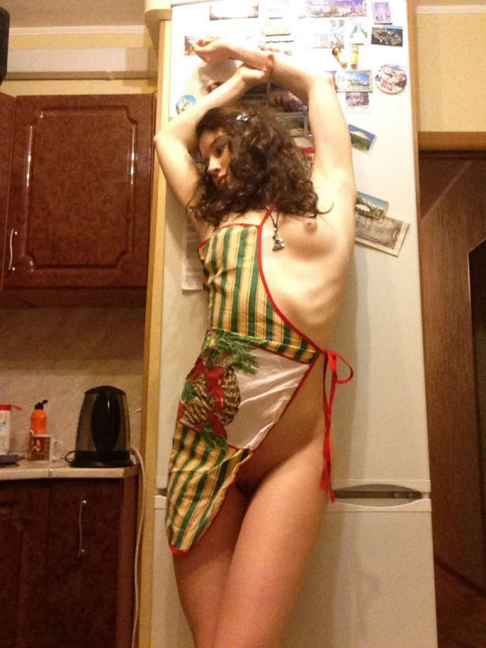 Russian amateur teen photos herself in kitchen