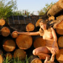 Sexy teen Alena T by the logs