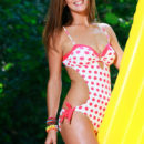 Gorgeous Fernanda on yellow beach mattress