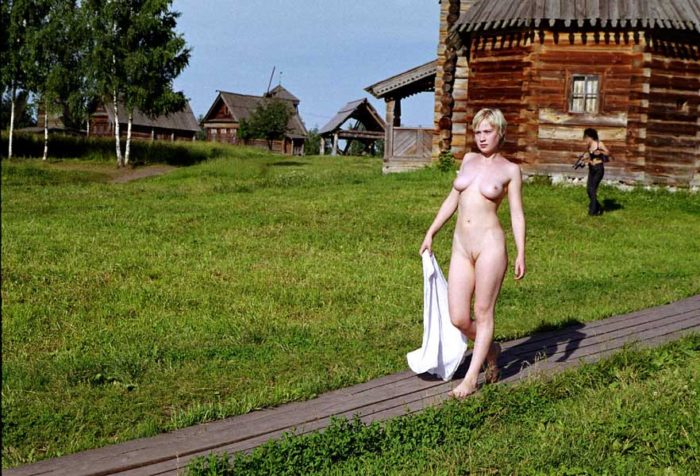 Vintage photos of naked short-haired blonde at outdoors russian museum