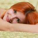 Redhead Violla A flaunts her gorgeous body and sweet pussy on the bed.