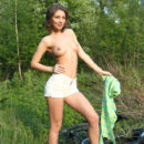 Galina A strips outdoors baring her sexy body.