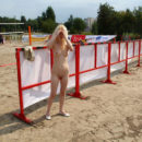 Blonde posing naked at public place