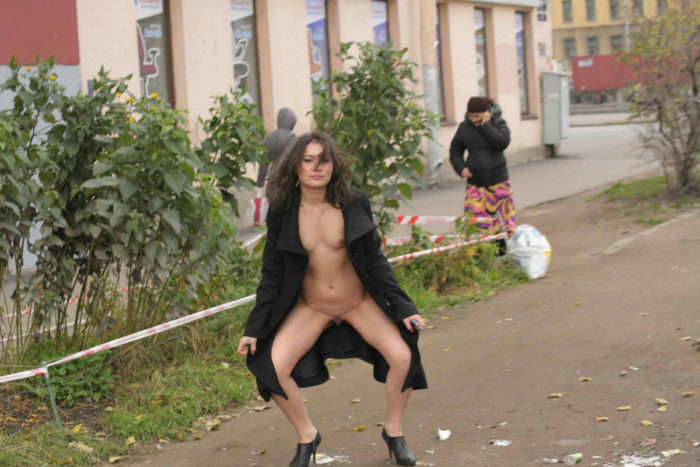 Small-tittied exhibitionist Nataly on the streets