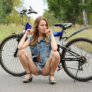 Russian blonde Lucia D on bycicle