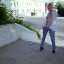 Short-haired blonde with perky boobs at varous public places