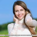 Violet delightfully poses outdoors as she spreads her legs, baring her sweet pussy.